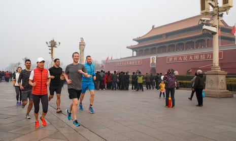 Facebook’s CEO, Mark Zuckerberg, and friends jog past Tiananmen Gate in Beijing.