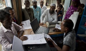 Assam villagers check their names on the final list of the National Register of Citizens (NRC) in India. 5760.jpg?width=300&quality=85&auto=forma