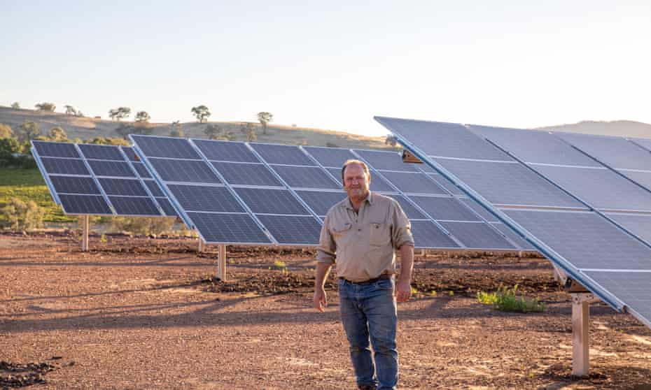 David Ritchie in front of his solar panel array at his winery in Mansfield, Victoria.