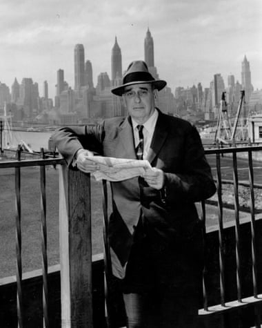 Robert Moses stands in front of Manhattan skyline in 1956.