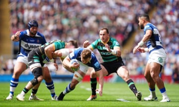 Bath’s Ted Hill is tackled by Northampton’s Tommy Freeman.