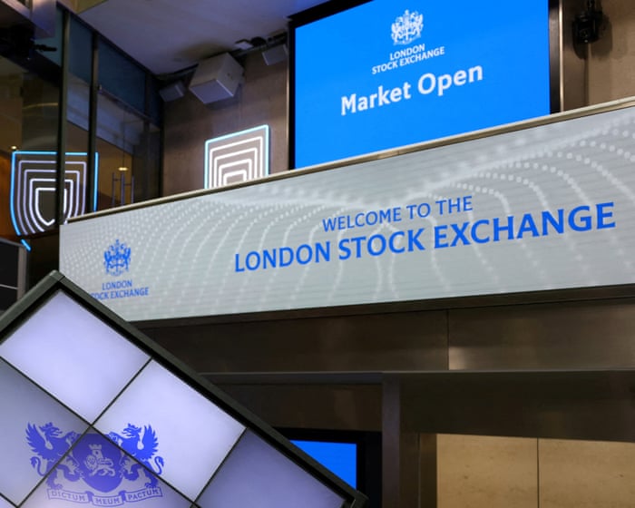 FTSE 100 share index hits record high as investors shrug off trade war fears – business live