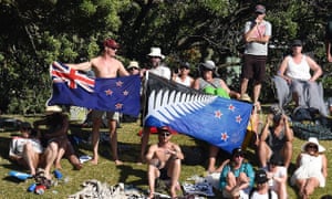 The proposed alternative New Zealand flag (right) is seen alongside the current flag during the cricket Tes between Australia and New Zealand in Wellington in February.