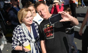 Collins poses for a selfie with a voter in Napier.