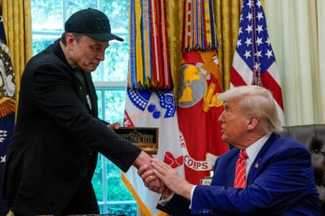 Elon Musk receives a golden key from Donald Trump in the Oval Office on 30 May, 2025.
