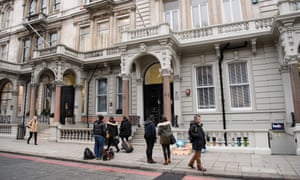 Journalists outside the London HQ of Orbis Business Intelligence.