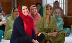 Jo Swinson (left) during a visit to the Gurdwara Singh Sabha Temple in Glasgow.