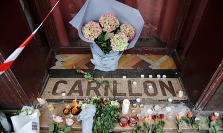 Flowers on the doorstep of the Le Carillon restaurant in Paris.