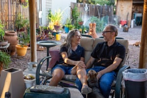 Ann, 66, and Bill Whitmire, 56, at their home in Phoenix, Arizona on Oct. 13, 2020. They each fell ill and recovered from COVID-19 earlier this year in July and January.