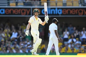 Australian batsman Travis Head celebrates scoring a half century during day two of the First Test match between Australia and Sri Lanka at The Gabba.