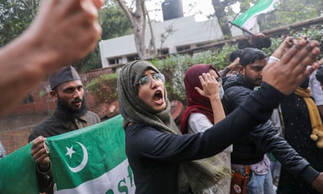 Muslim students  protest in New Delhi against the  hijab ban