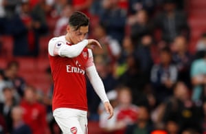 Ozil, dejected after the final whistle.
