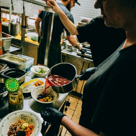 Staff prepare food in the kitchen