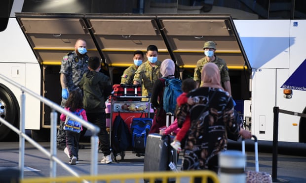 Passengers arrive at Sydney International Airport off a Qatar Airways flight