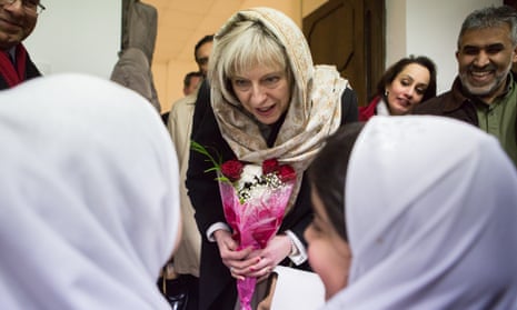 Theresa May visits Al Madina mosque in east London as home secretary in 2015.