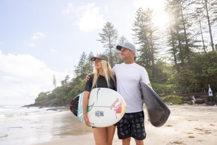 Josh and Sierra Kerr look out at the water at Greenmount Beach in Queensland
