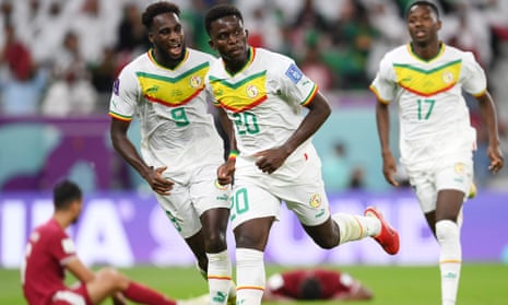 Bamba Dieng celebrates after scoring Senegal's third goal against Qatar.