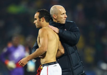 Bob Bradley head coach of USA consoles dejected Landon Donovan after being knocked out of the tournament after the 2010 FIFA World Cup South Africa Round of Sixteen match between USA and Ghana at Royal Bafokeng Stadium on June 26, 2010 in Rustenburg, South Africa.