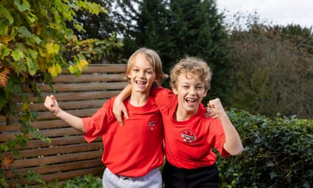 England’s united nations of football: 32 teams, one World Cup – and a lot of excited kids | World Cup 2022 10 Ivan and Marvin Wiley in their garden wearing red Canada World Cup shirts