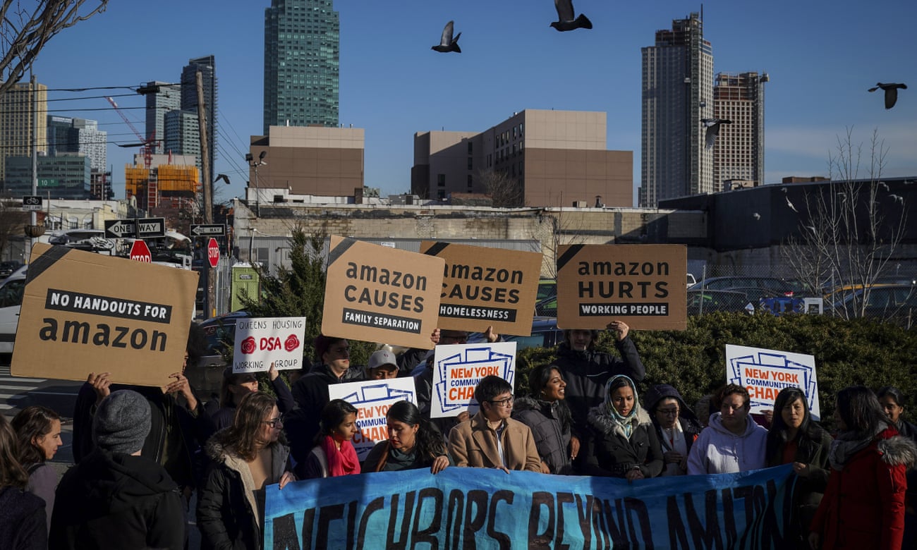 Activists and community members rally against Amazon’s plan to move into Queens