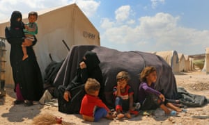 Displaced people at a camp in Kafr Lusin, Idlib province, near the Bab al-Hawa border crossing between Syria and Turkey.