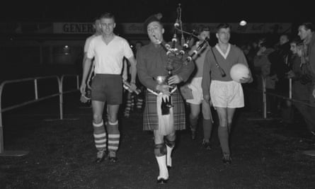 The Rangers and Sparta Rotterdam players walk out before their European Cup match in 1960.