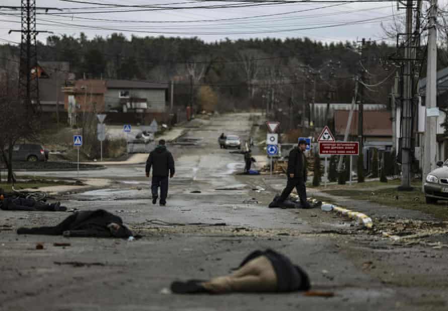 Bodies lie on a street in Bucha