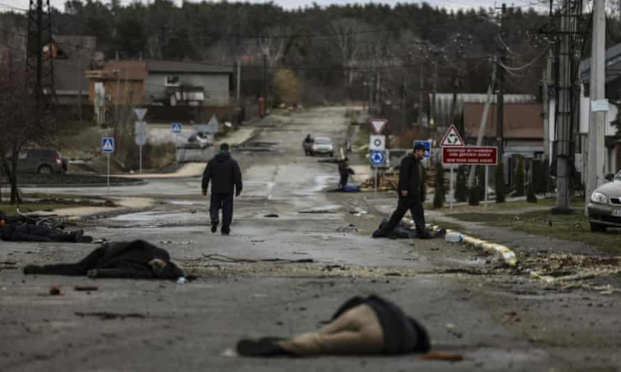 Bodies lie on a street in Bucha