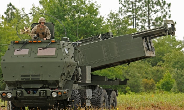 Marine Corps Sgt. Justin Russell, a High Mobility Artillery Rocket System, or HIMARS, section chief with Kilo Battery, 2nd Battalion, 14th Marines looks out over a firing range at Fort Stewart, Ga. during a training exercise, Saturday, June 13, 2015.