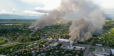 An aerial view of burning buildings in Port Moresby, amid protests over a pay cut for police that officials blamed on an administrative glitch earlier this month.