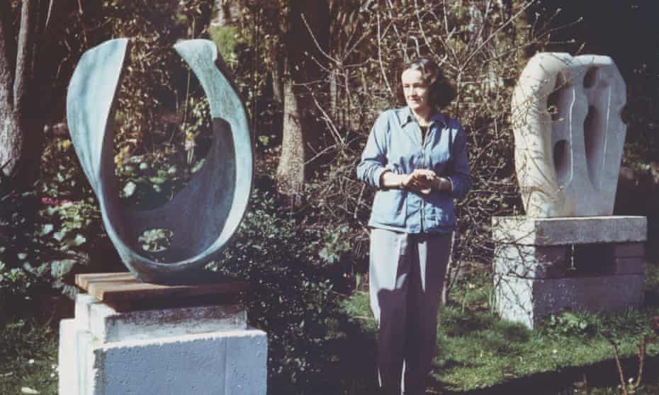 Barbara Hepworth with her sculptures in her garden in St Ives, Cornwall.