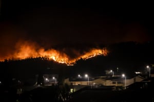 a wildfire burning at night