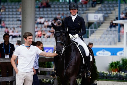 Thomas Müller hanging out at some dressage with his wife, Lisa, back in 2022.