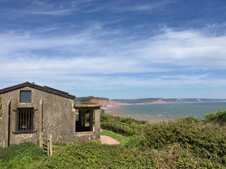 Bare concrete structure overlooking picturesque bay and sea