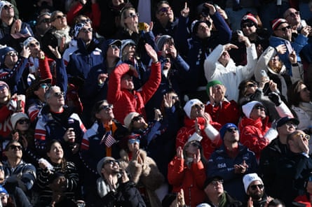 Spectators watch from the ground as Lindsey Vonn is airlifted to hospital.