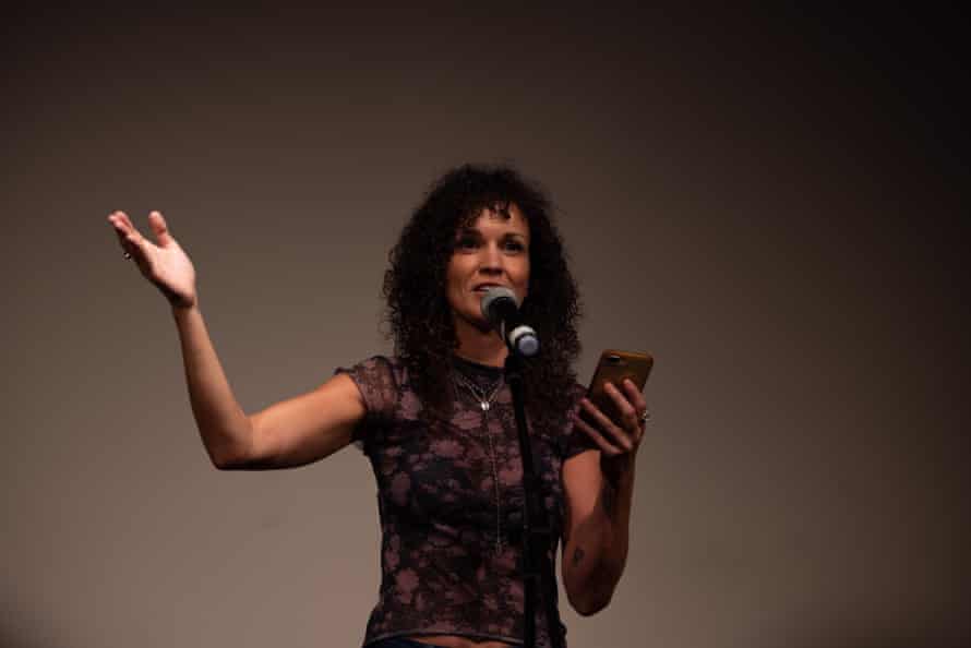 Winner of the evening Dai reciting her poem
