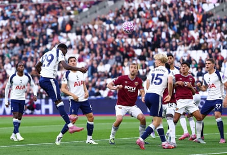Pape Matar Sarr rises to score Tottenham’s first goal against West Ham.