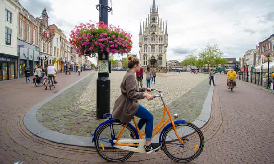 cycling in the main square of Gouda.