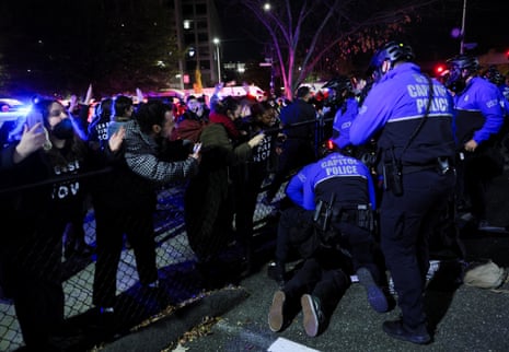 Police officers detain a demonstrator during a multi-denominational event hosted by the Democratic Socialists of America, IfNotNow Movement and Jewish Voice for Peace calling for a ceasefire in the conflict between Israel and Palestinian Islamist group Hamas, in Washington, U.S. November 15, 2023.