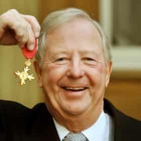 Tim Brooke-Taylor, proudly holds his OBE in 2011.
