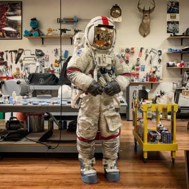 Ryan Nagata modelling his high-fidelity replica of an Apollo A7LB spacesuit in his workshop A spacesuit has been described as a ‘wearable spacecraft of the smallest possible dimensions’. It has to provide oxygen, get rid of carbon dioxide, regulate extreme temperature fluctuations and protect against the micrometeoroid flux density in the vacuum of space or on the lunar surface. It has to maintain an airtight bubble of atmospheric pressure flexible enough for an astronaut to be mobile, while keeping a constant volume. No easy task