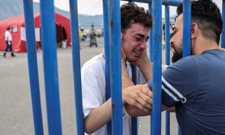 Syrian survivor Fedi, 18, rescued from the sea off Greece, sheds tears as he reunites with his brother Mohammad in Kalamata, Greece.