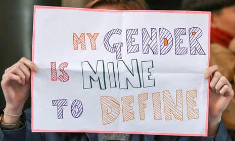 A protest sign saying 'My gender is mine to define'