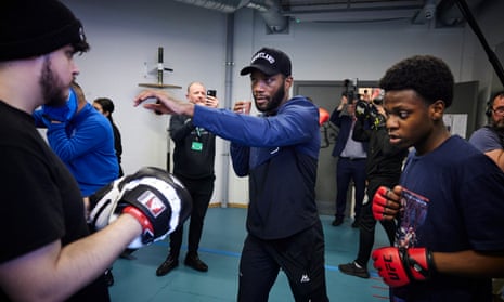 Leon Edwards passes on some tips at the Way youth centre in Wolverhampton