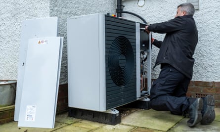 An air source heat pump repair worker