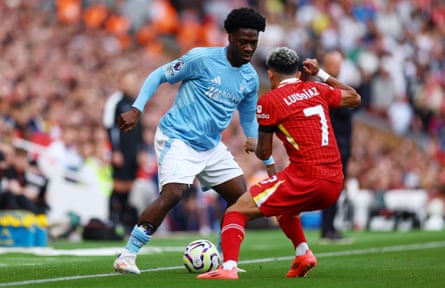 Nottingham Forest’s Ola Aina in action with Liverpool’s Luis Díaz.