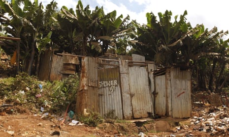 A public toilet made of rusty sheets of metal in Kibera slum in Nairobi, Kenya.