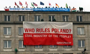 Greenpeace environmentalists protest against the International Coal and Climate Summit in Warsaw