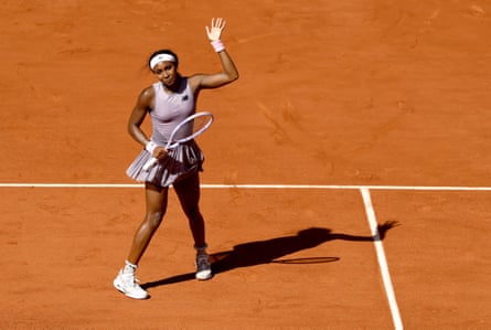 Coco Gauff celebrates after advancing to the second round at Roland Garros.