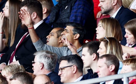 Prime minister Rishi Sunak watches on during the game